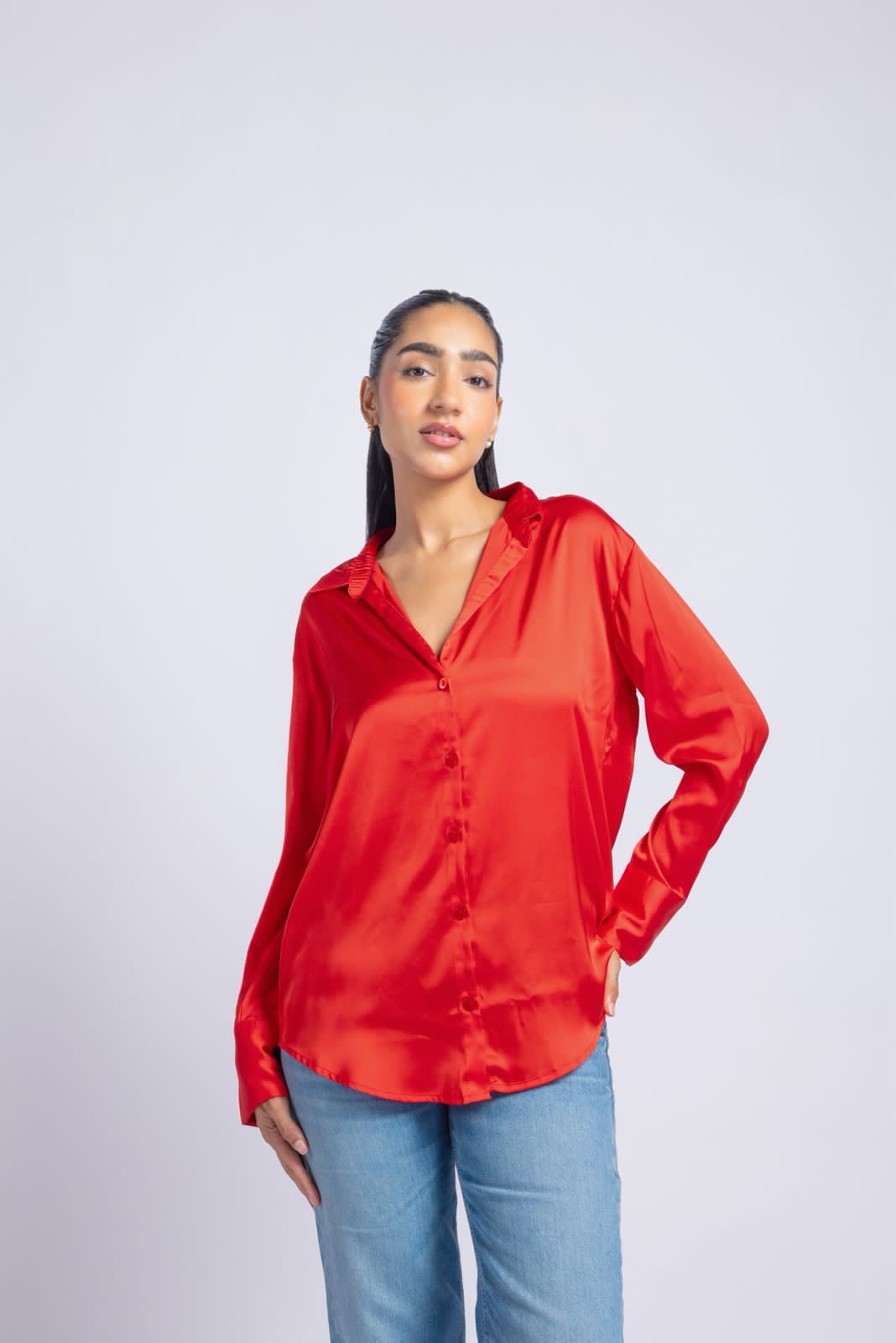 Red satin shirt with a soft lightweight feel.