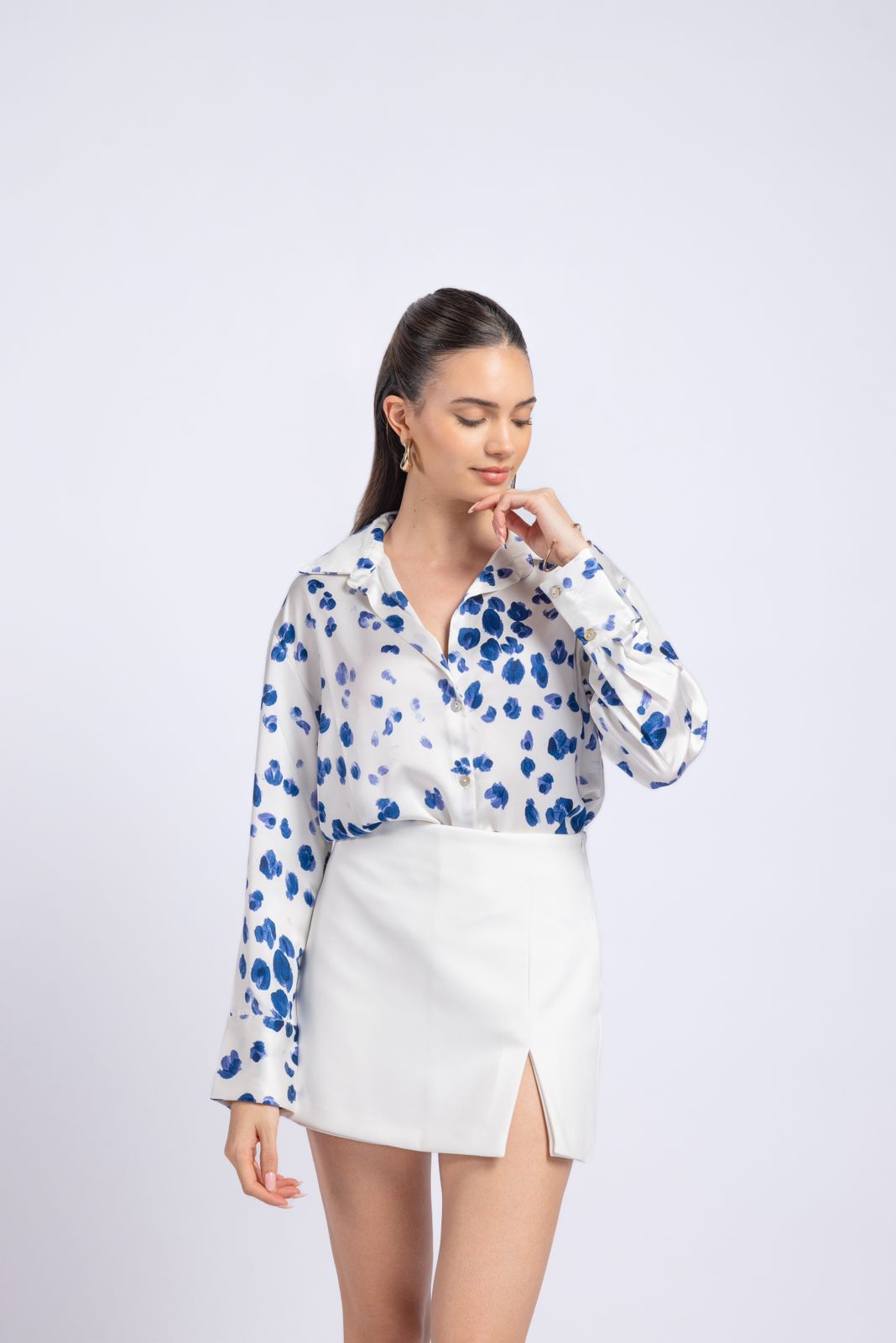 White Shirt with Blue Printed Design .