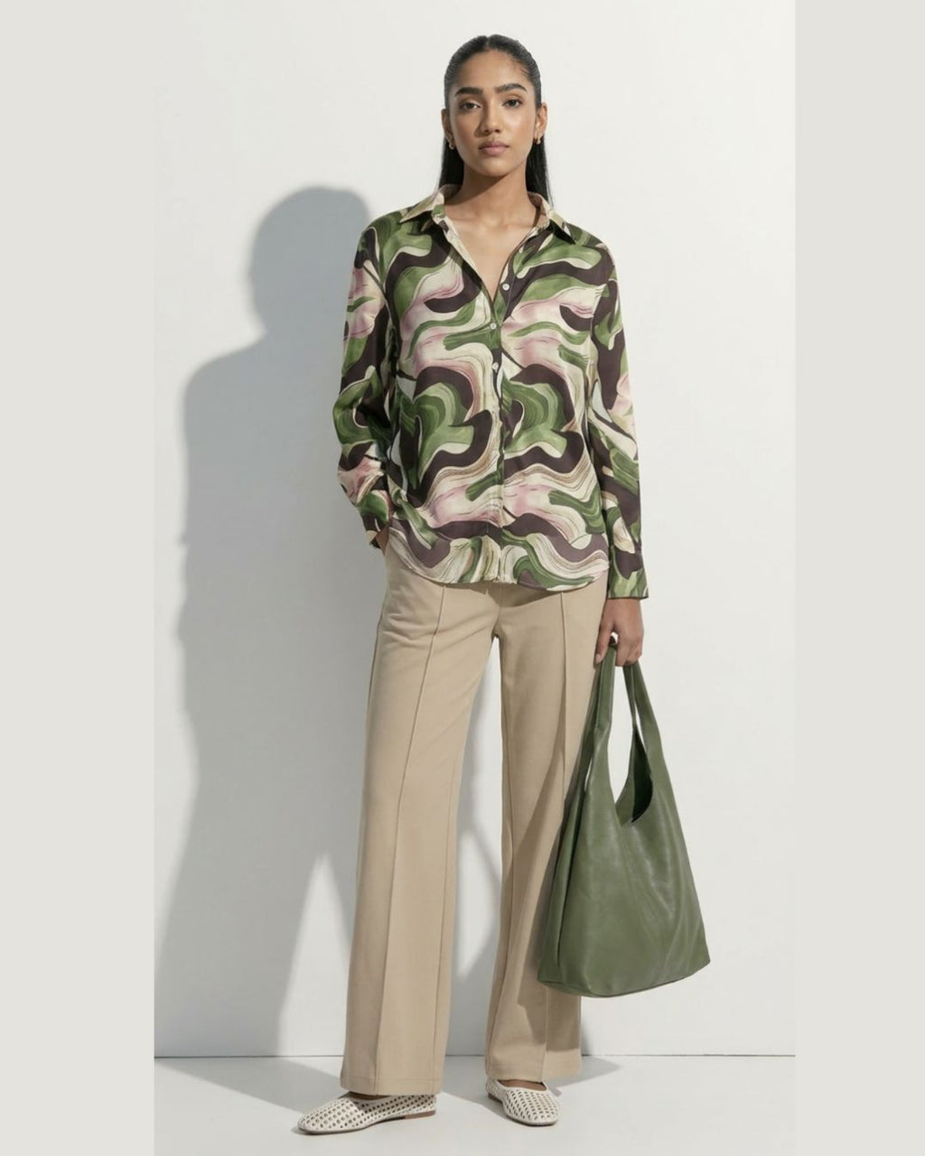 Woman wearing a patterned shirt and Soft and Silk Satin Fabric