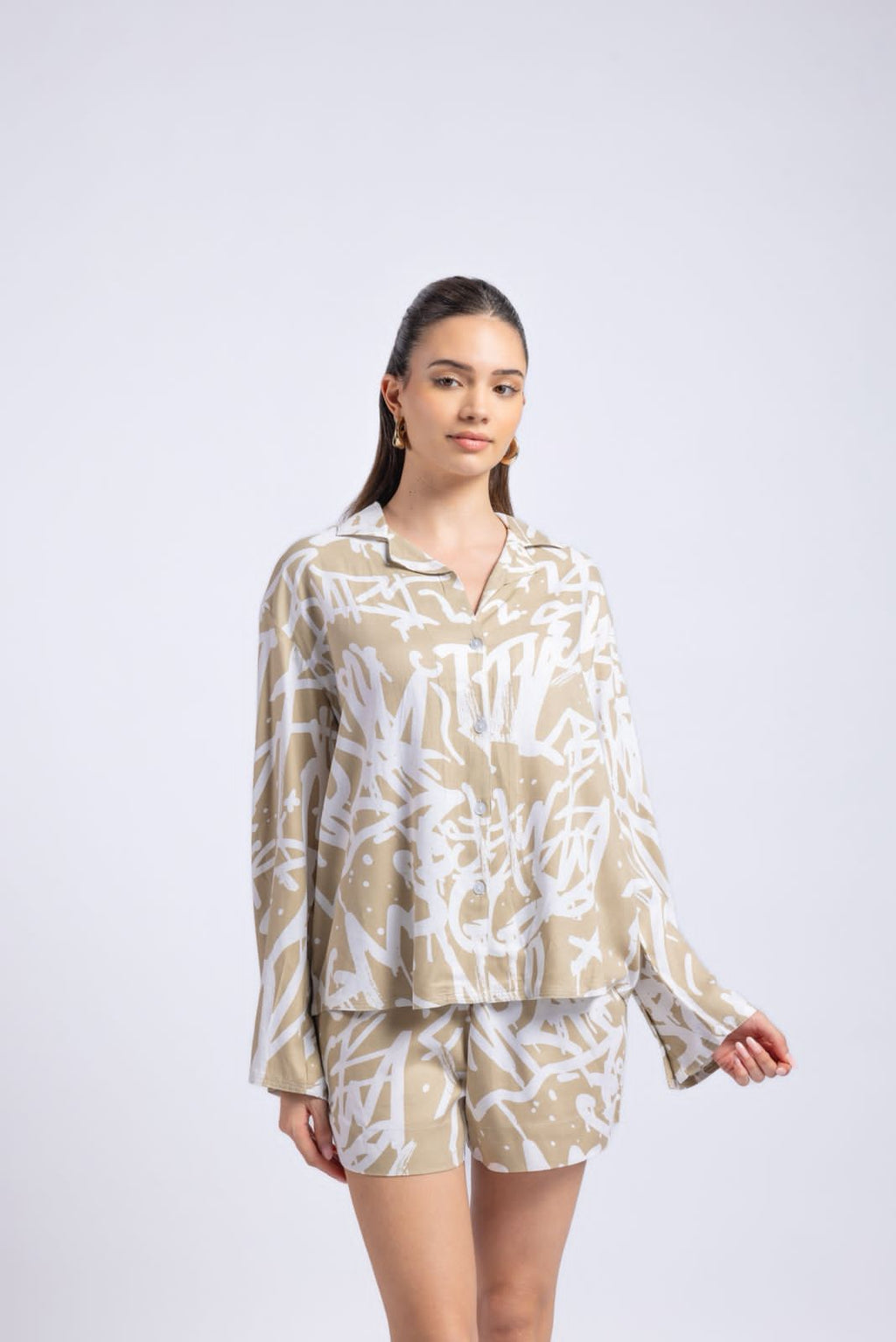 Women beige printed co-ord set front angle oversized shirt and shorts outfit