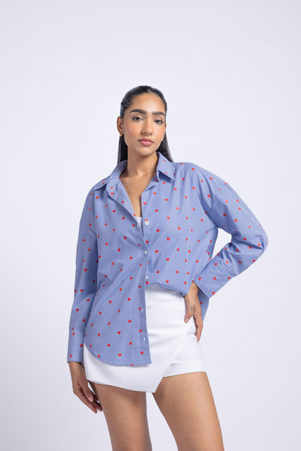 Blue heart print striped cotton shirt women front view long sleeve collared shirt