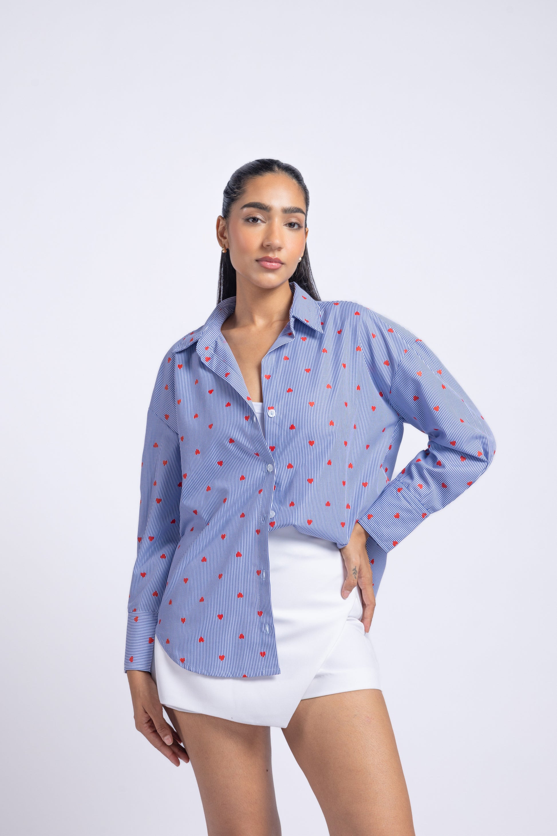 Blue heart print striped cotton shirt women front view long sleeve collared shirt