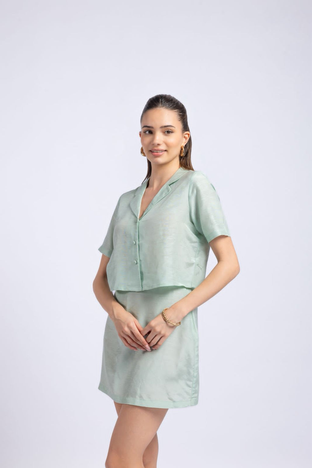 Women mint green crop top and skirt co-ord set front angle pastel outfit